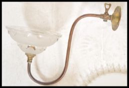 An early 20th century milk glass rise and fall chandelier light together with a pair of brass s-