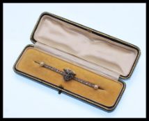 A 19th Century Victorian gold, diamond and pearl bar brooch having a modelled fox head to the