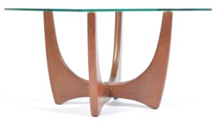 A MID CENTURY G-PLAN TEAK WOOD AND GLASS COFFEE TABLE