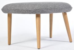 AFTER HANS WEGNER A CONTEMPORARY FOOTSTOOL / OTTOMAN