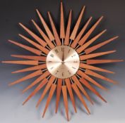 AFTER GEORGE NELSON A CONTEMPORARY STARBURST WALL CLOCK