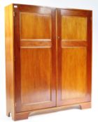 A 20TH CENTURY INDUSTRIAL MAHOGANY OFFICE SCHOOL CUPBOARD