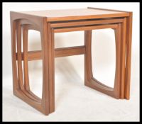 A G-Plan retro teak wood 1970's graduating nest of tables in the Quadrille pattern. The tables