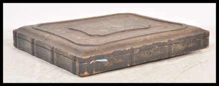 A 19th Century Chinese lacquer robe box of square form having hand painted decoration. Lift off