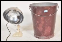 A vintage 20th Century desk top heat lamp by Pifco together with a vintage 20th Century painted fire