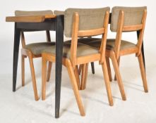 A retro vintage mid 20th Century teak wood topped extendable dining table of rectangular form,