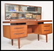 A vintage retro 20th Century retro teak wood G-Plan Kelso dressing table having pedestals of drawers