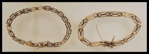 Two hallmarked 9ct gold flat link bracelet chains one having hidden clasp with foldover catch and