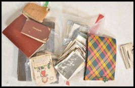 A large collection of postcards and greeting cards dating from the early 20th Century to include
