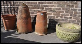 A collection of vintage 20th Century well weathered terracotta rhubarb forcers, one stamped James