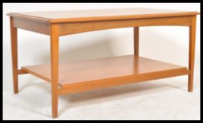 Stag Furniture - A vintage retro 20th Century teak wood nest of tables raised on tapering legs