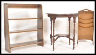 A collection of three pieces of furniture to include a mid Century open waterfall bookcase, a late