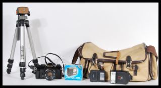 A vintage 20th Century Miranda MS1 Super camera having a 94409990 50mm lens complete in carry camera