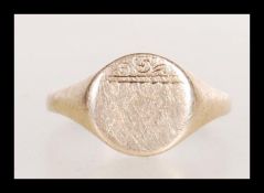 A 9ct gold gentleman's signet ring with plain cartouche front, size L and 1.9g