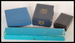 A collection of vintage designer vintage jewellery boxes to include two A. Tillander boxes and two