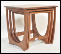 A G-Plan retro teak wood 1970's graduating nest of tables in the Quadrille pattern. The tables