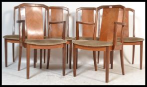 A set of six retro 20th Century G Plan teak wood Fresco dining chairs ( two being carvers ), splay