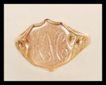 A 19th Century Victorian hallmarked 9ct gold signet ring having engraved armorial cartouche panel.