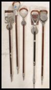 A collection of five vintage 20th Century shooting sticks to include The Perfect, an Elite, Howells,