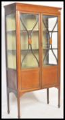 An early 20th Century Edwardian mahogany inlaid glazed two door display cabinet vitrine /