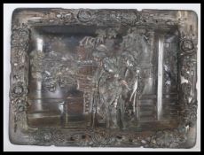 A Japanese bronzed tray, fret pierced border decorated with flowers having a central panel of