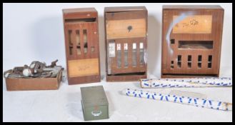 A set of three 20th Century retro industrial prototype cigarette dispenser cases now converted