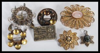 A collection of silver Yiddish / Jewish jewellery to include mostly brooches dating from the early