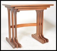 A G-Plan retro teak wood 1970's graduating nest of tables in the Quadrille pattern. The tables
