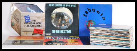 A collection of vinyl long play LP records featuring several artists to include Bob Dylan, Buddy