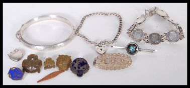 A collection of vintage ladies silver 925 and hallmarked jewellery to include a silver coin bracelet