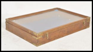 A vintage 20th Century counter top shop display jewellery cabinet of wooden construction having