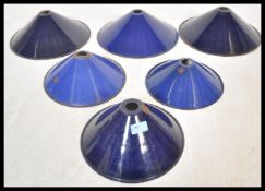 A set of six vintage retro 20th Century industrial factory pendant shades all finished in a blue