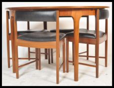 A.H. McIntosh Of Kirkcaldy - A mid 20th century retro vintage teak wood dining suite comprising of a