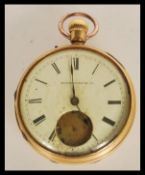 A hallmarked 18ct gold open face pocket watch marked Hampden watch company, having a white enamelled