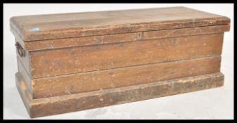 A 19th Century Victorian pine woodworking toolbox  / blanket box chest having a hinged top with side