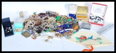 A collection of vintage costume jewellery to include a selection of beaded necklaces, a ladies
