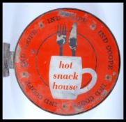 A vintage retro double sided point of sale advertising sign, the double sided circular sign