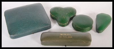 A collection of vintage designer jewellery boxes for Child & Child of differing shapes and sizes,