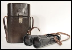 A good pair of original Carl Zeiss 8x56 B Dialyt binoculars complete in the leather case with rubber