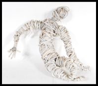 A vintage retro 20th Century unusual statue figurine constructed out of wounded wire in the manner