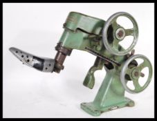A vintage 20th Century German cast metal Rafflenbeul Euperdus mechanical cobblers shoe repair