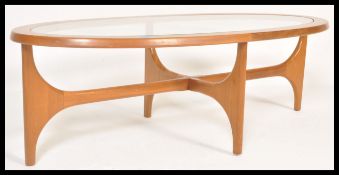 Stonehill - Stateroom - A vintage retro 20th Century teak wood oval coffee table with inset glass