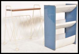 A vintage retro 20th Century Sputnik Atomic magazine rack along with a tin vegetable rack.