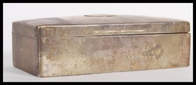 A silver hallmarked 20th Century desk top cigarette case / box. The rectangular box with hinged