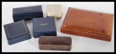 A selection of vintage Tiffany & Co jewellery boxes to include three blue leatherette boxes, a