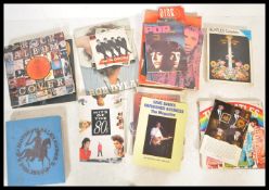 A collection of vintage 20th Century music memorabilia to include Bob Dylan, The Beatles ' An