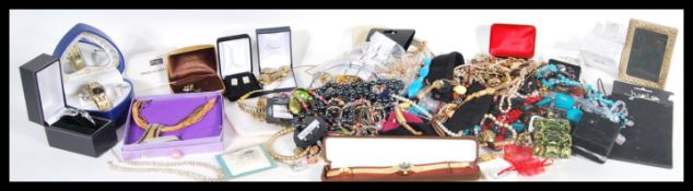 A collection of vintage costume jewellery to include ladies dress necklaces, beaded necklaces,