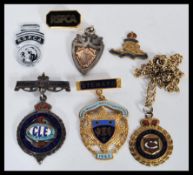 A group of vintage 20th Century enamel fob medals to include a large silver hallmarked example, gold