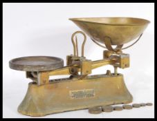 A late 19th / early 20th Century brass sweet shop counter top weighing scales for Yandell and Sons