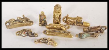 A collection of 20th Century erotic fertility pendants in the form of a selection of animals on